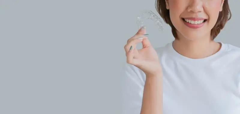 Dlaczego warto wybrac leczenie invisalign